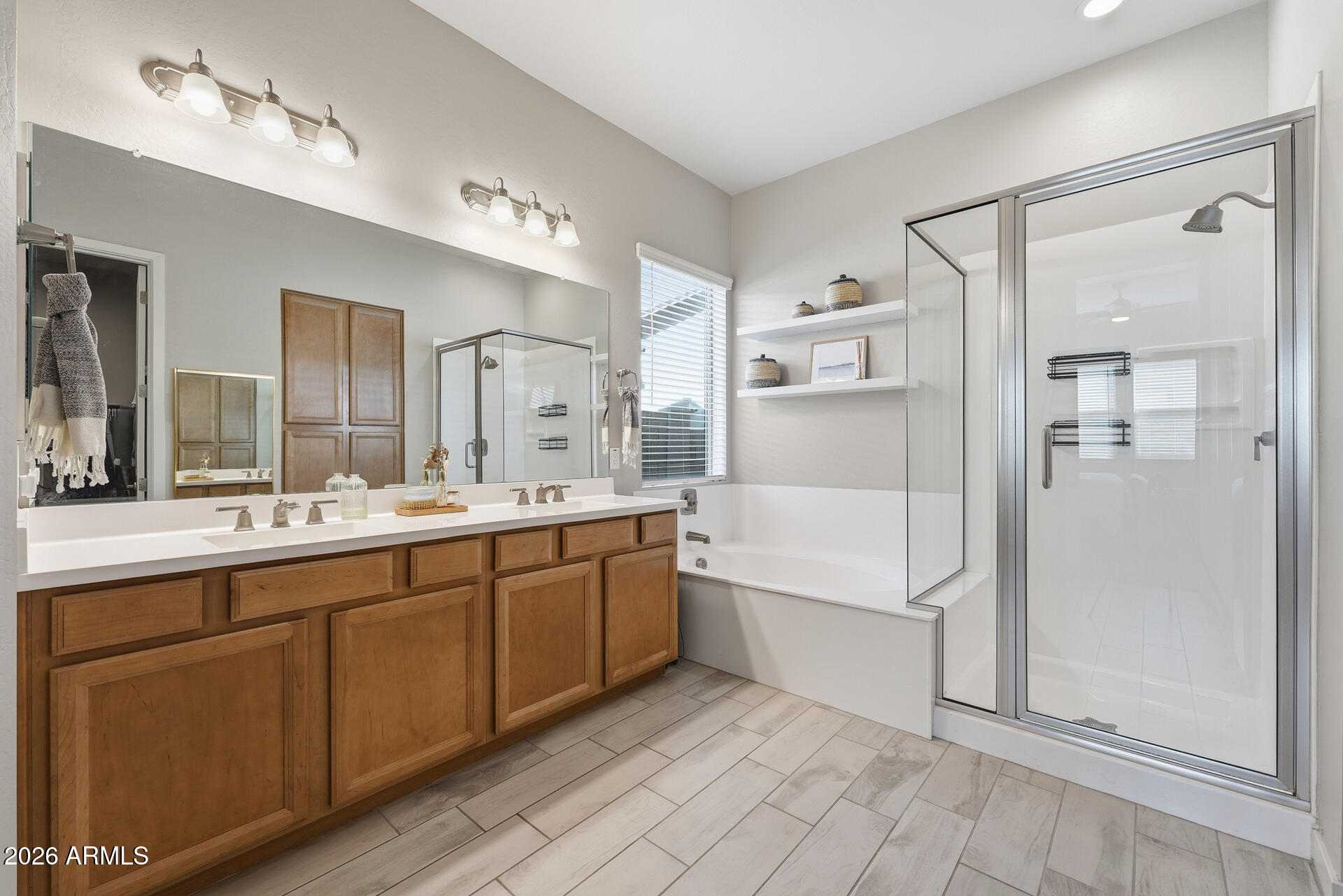 23069 East Mayberry Road Queen Creek, AZ 85142 - Photo 20 of 48 a large bathroom with a large tub sink shower and mirror