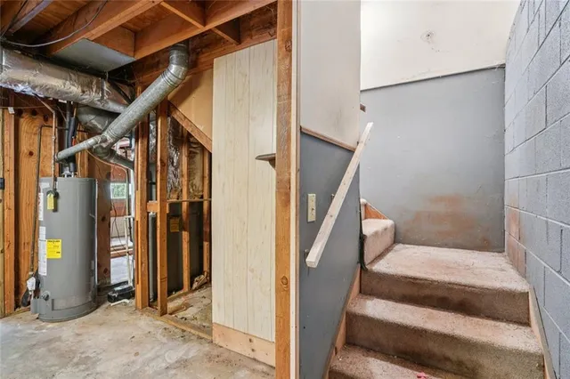 a view of a room with wooden walls