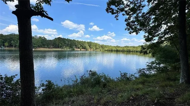 a view of a lake in middle of the house
