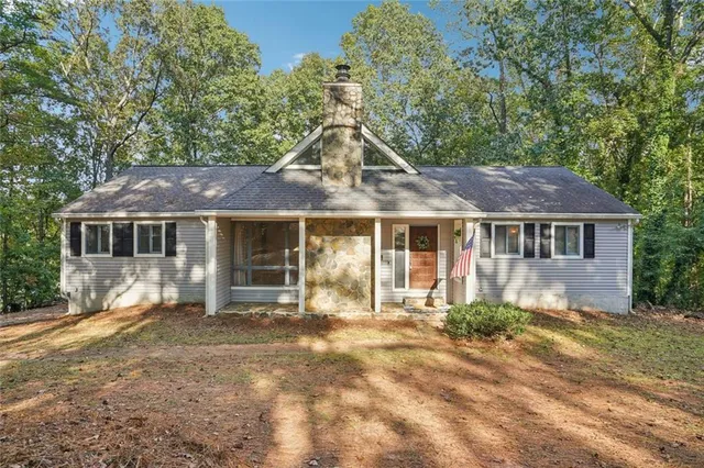 a front view of a house with yard