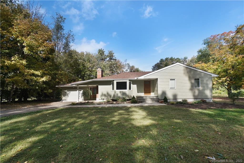 30 Orlando Road Wallingford, CT 06492 - Photo 1 of 1 Large front yard and beautiful rock walkway to the front door.