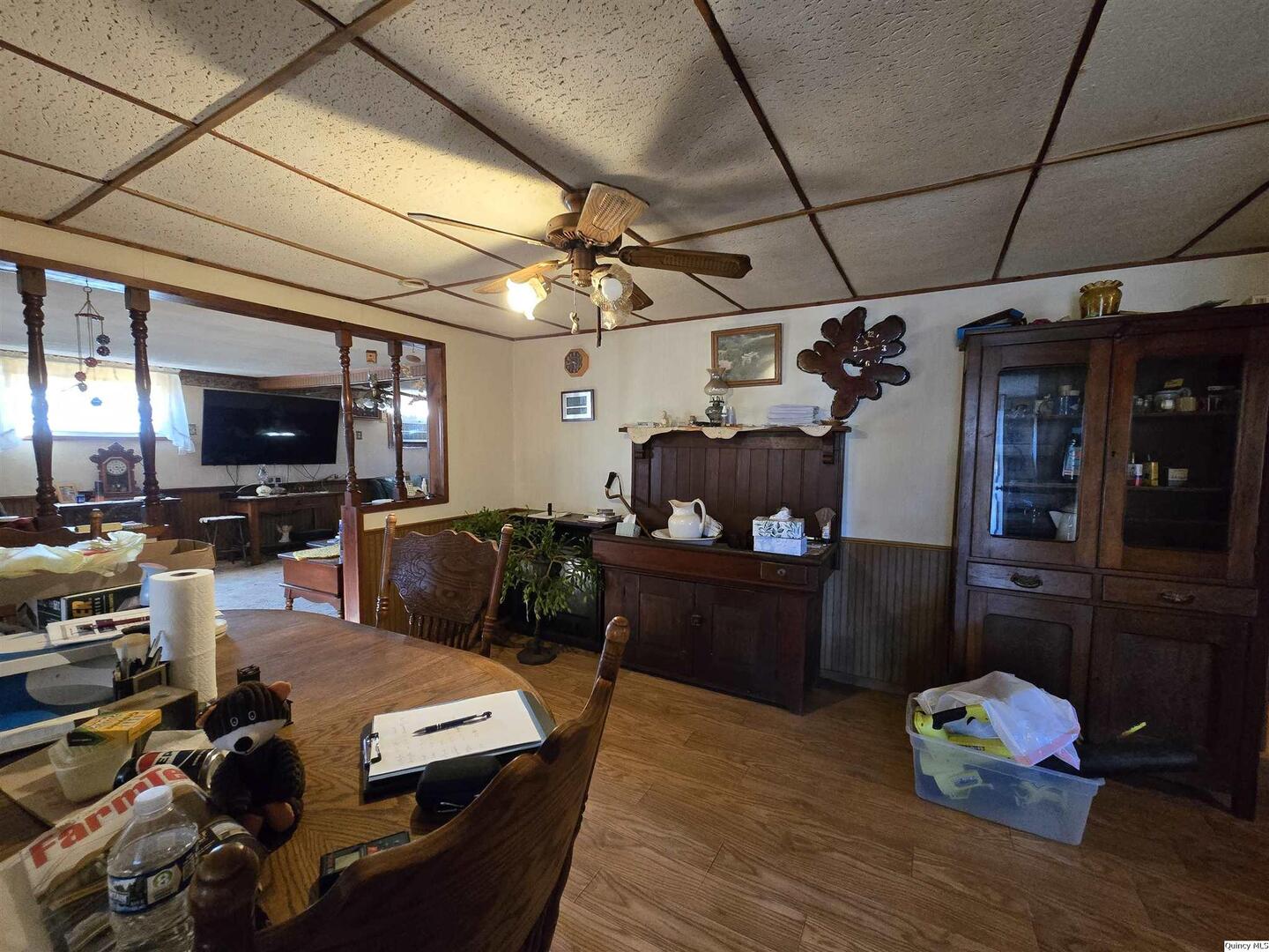 2219 North 1350th Avenue Camp Point, IL 62320 - Photo 4 of 16 a living room with furniture and a flat screen tv