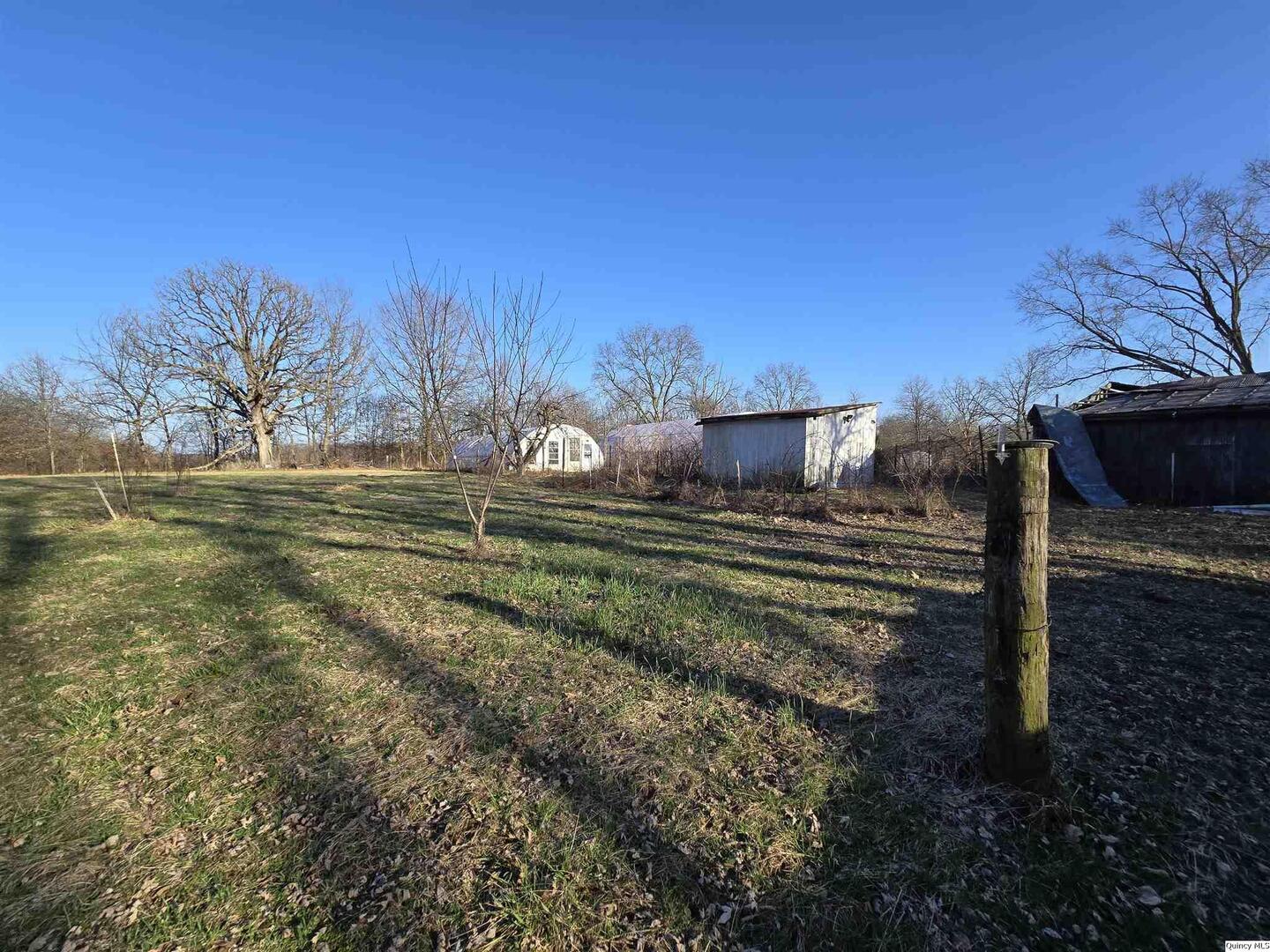 2219 North 1350th Avenue Camp Point, IL 62320 - Photo 9 of 16 a view of a backyard