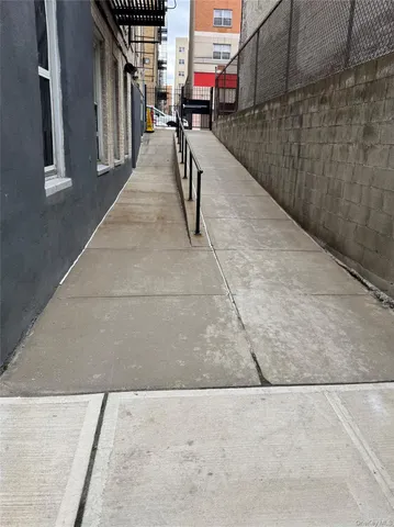 a front view of a building with street view