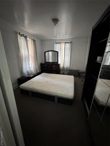 a bathroom with a toilet sink and bathtub