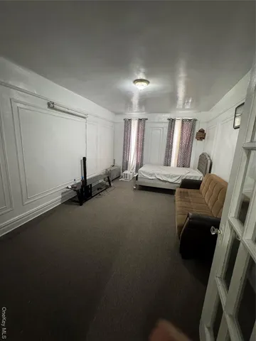 a kitchen with a sink a stove and a refrigerator