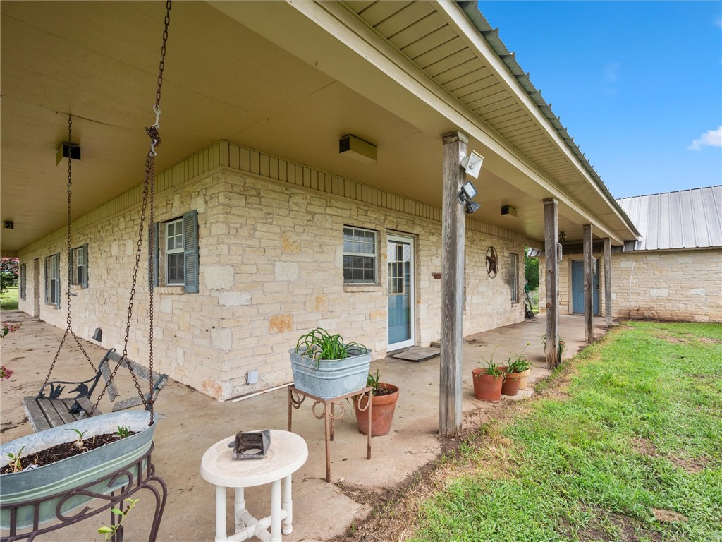 17645 Highway 6 Navasota, TX 77868 - Photo 13 of 30 a front view of a house with garden