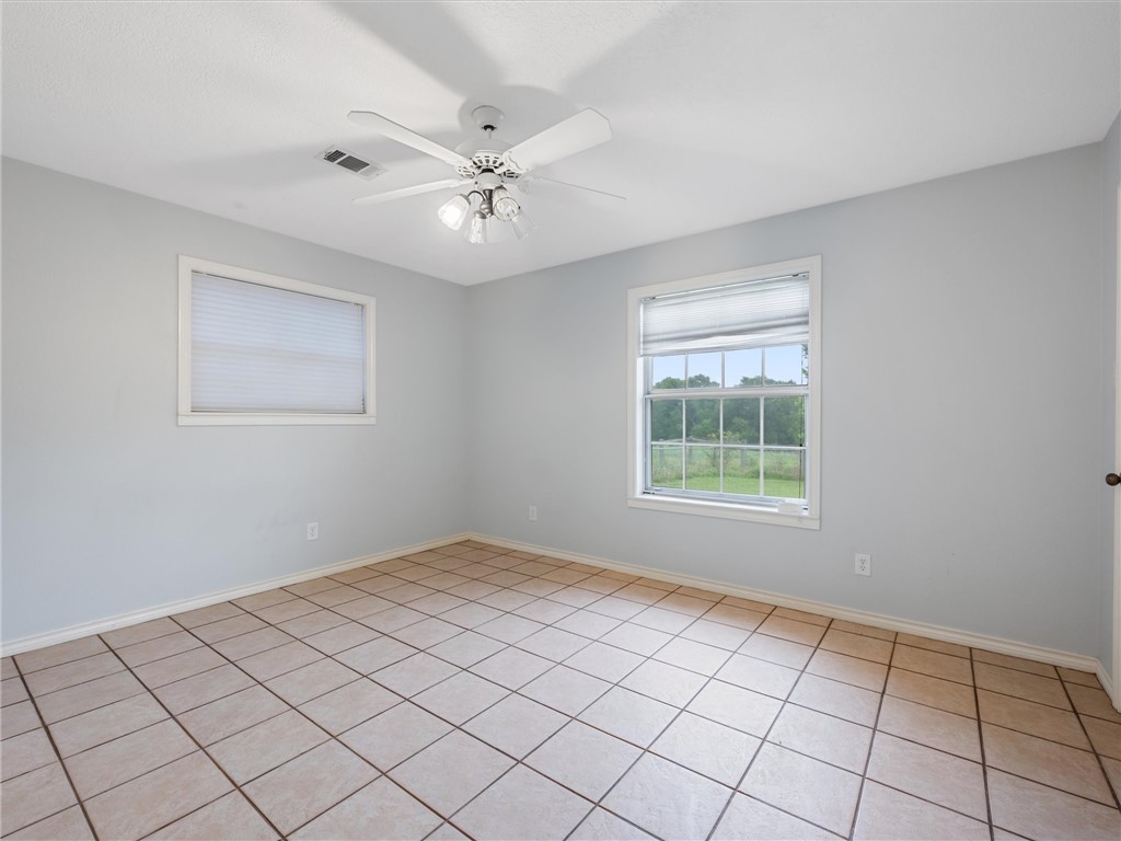 17645 Highway 6 Navasota, TX 77868 - Photo 24 of 30 a view of an empty room with a window