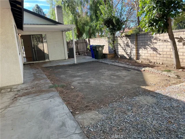 a view of a house with a yard and garage