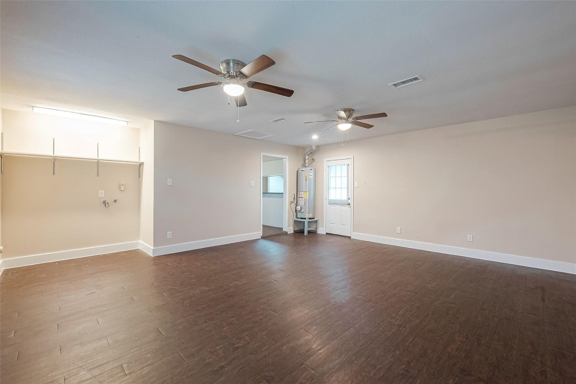 1447 Willow Rock Road Houston, TX 77088 - Photo 18 of 37 a view of an empty room with a window