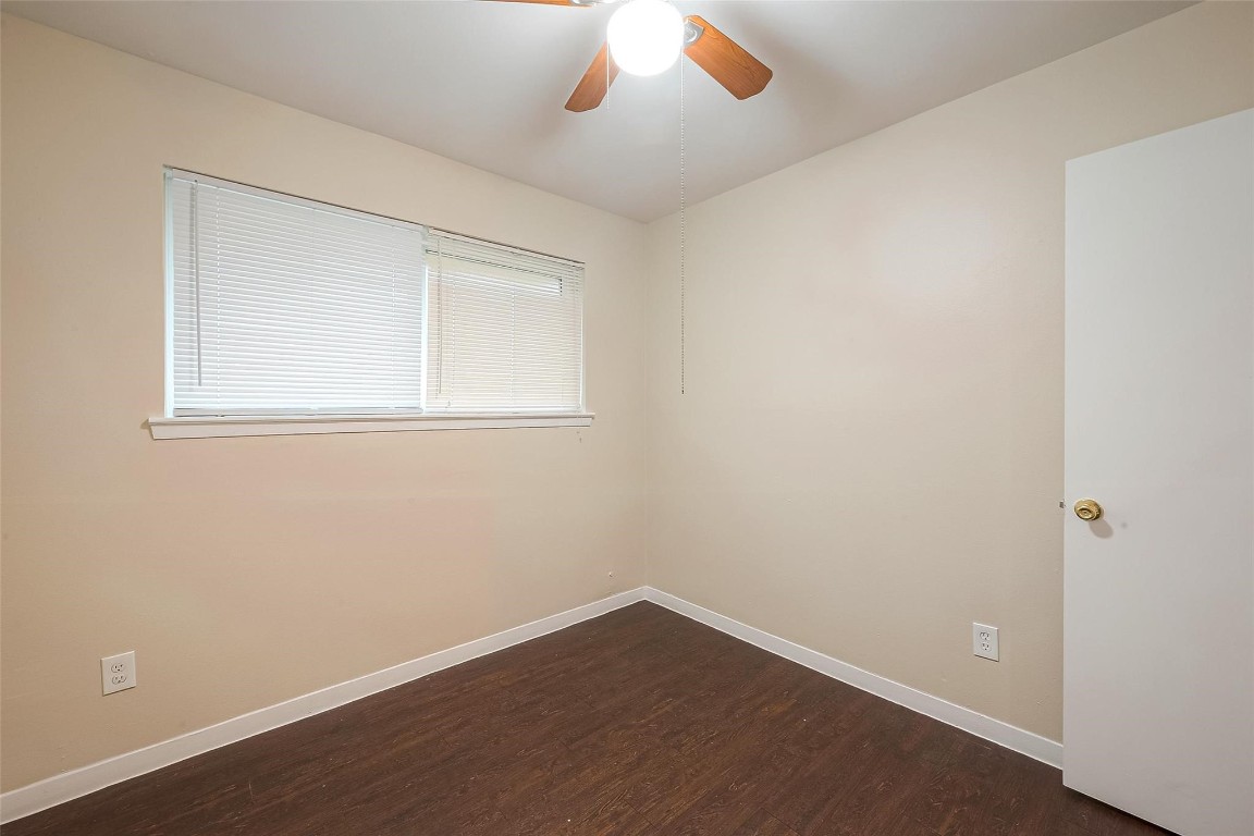 1447 Willow Rock Road Houston, TX 77088 - Photo 28 of 37 an empty room with a window