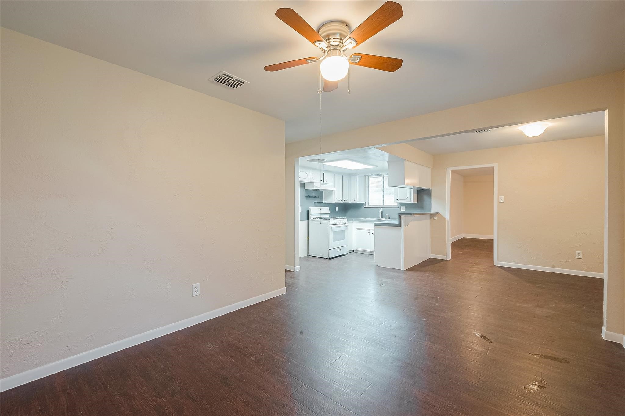 1447 Willow Rock Road Houston, TX 77088 - Photo 6 of 37 a view of kitchen with wooden floor