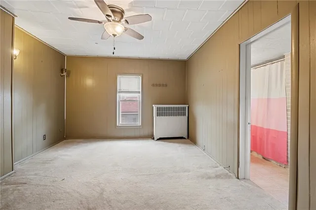 a bathroom with a toilet a sink and a shower