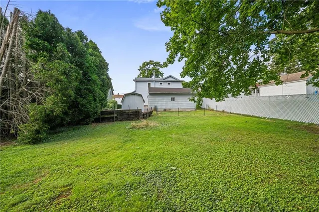 a view of an outdoor space and a yard