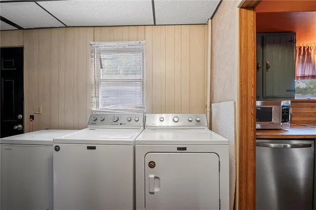 a utility room with dryer and washer