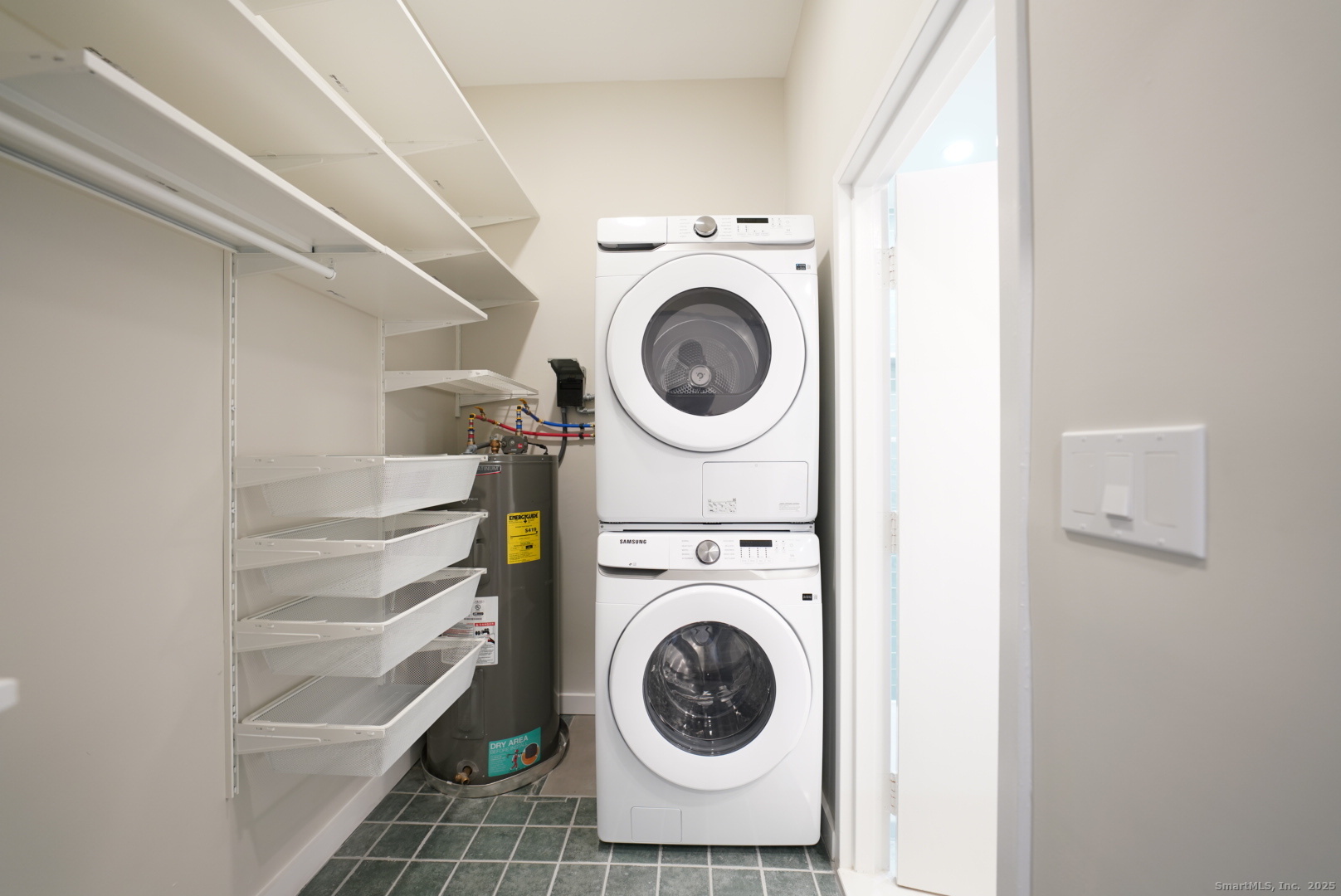 94 Washington Street, Unit 3 Norwalk, CT 06854 - Photo 5 of 8 a utility room with dryer and washer