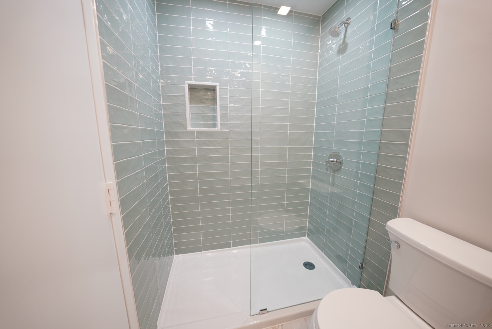 94 Washington Street, Unit 3 Norwalk, CT 06854 - Photo 7 of 8 a bathroom with a toilet and a shower