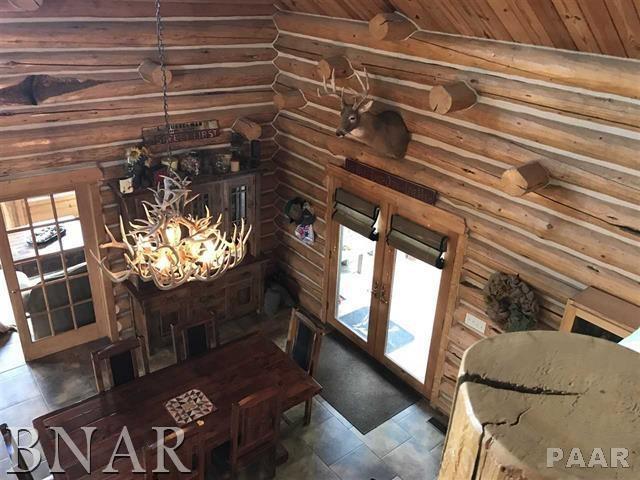 2631 East 1685th Road North Danvers, IL 61732 - Photo 22 of 30 a view of living room with furniture and a chandelier