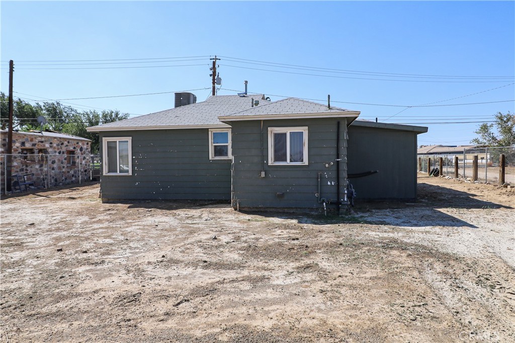 25466 Jasper Road Barstow, CA 92311 - Photo 6 of 32 a house view with a backyard space