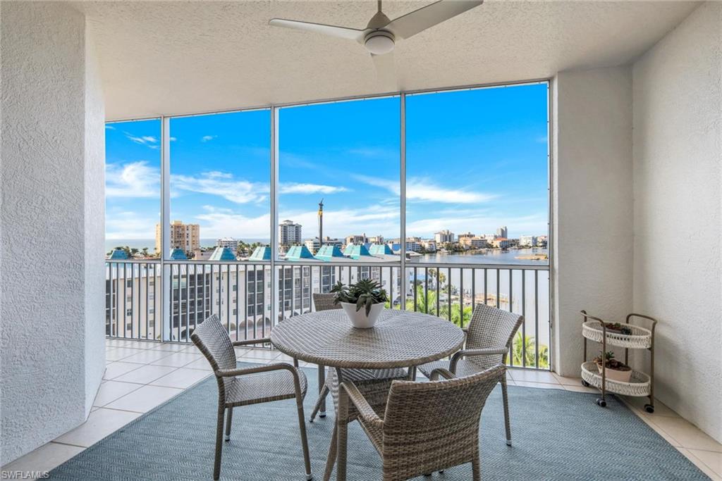 400 Flagship Drive, Unit 705 Naples, FL 34108 - Photo 11 of 25 a view of a dining room with furniture window and outside view