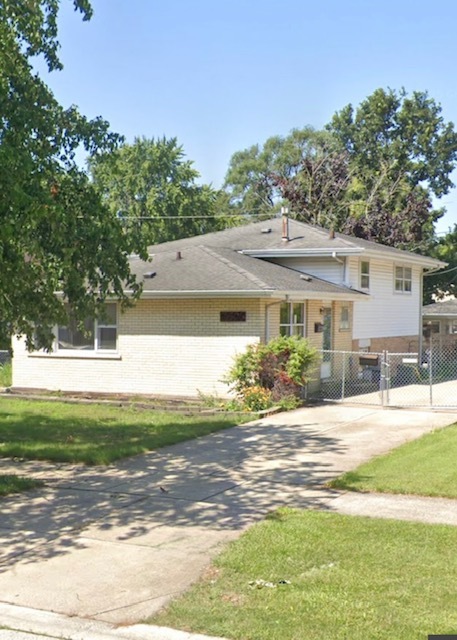 14506 Knox Avenue Midlothian, IL 60445 - Photo 1 of 1 a front view of a house with a yard