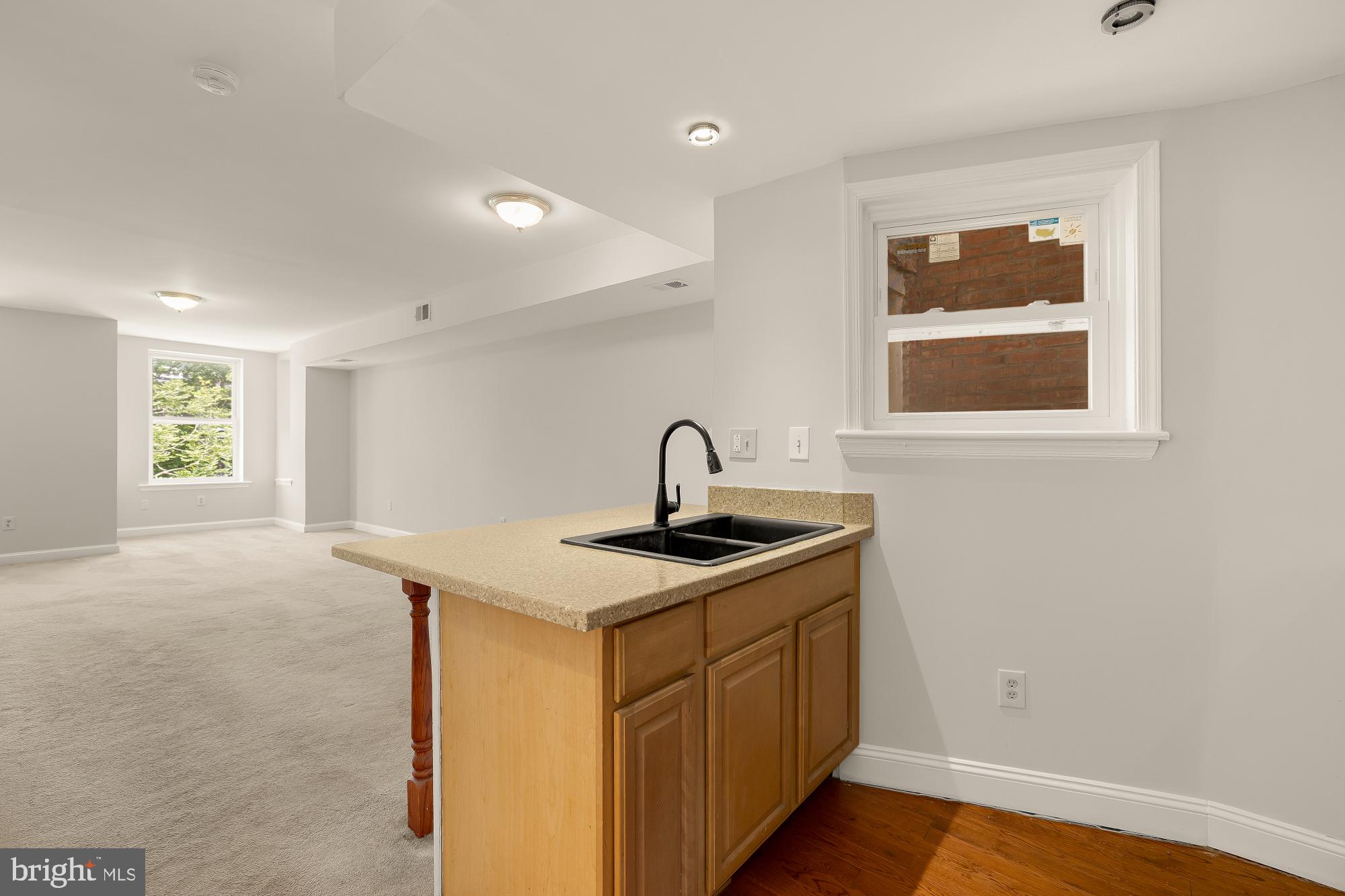 601 L Street Northeast Washington, DC 20002 - Photo 25 of 47 a kitchen with a sink and a window