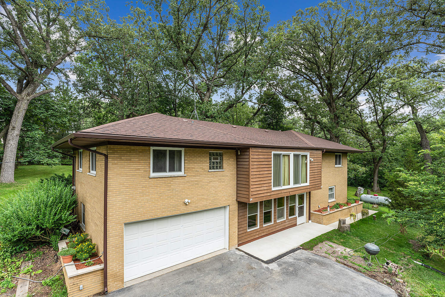 27960 South Klemme Road Beecher, IL 60401 - Photo 2 of 24 a view of a house with a yard plants and large tree