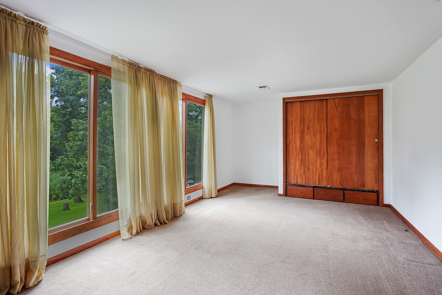 27960 South Klemme Road Beecher, IL 60401 - Photo 9 of 24 a view of empty room with floor to ceiling window