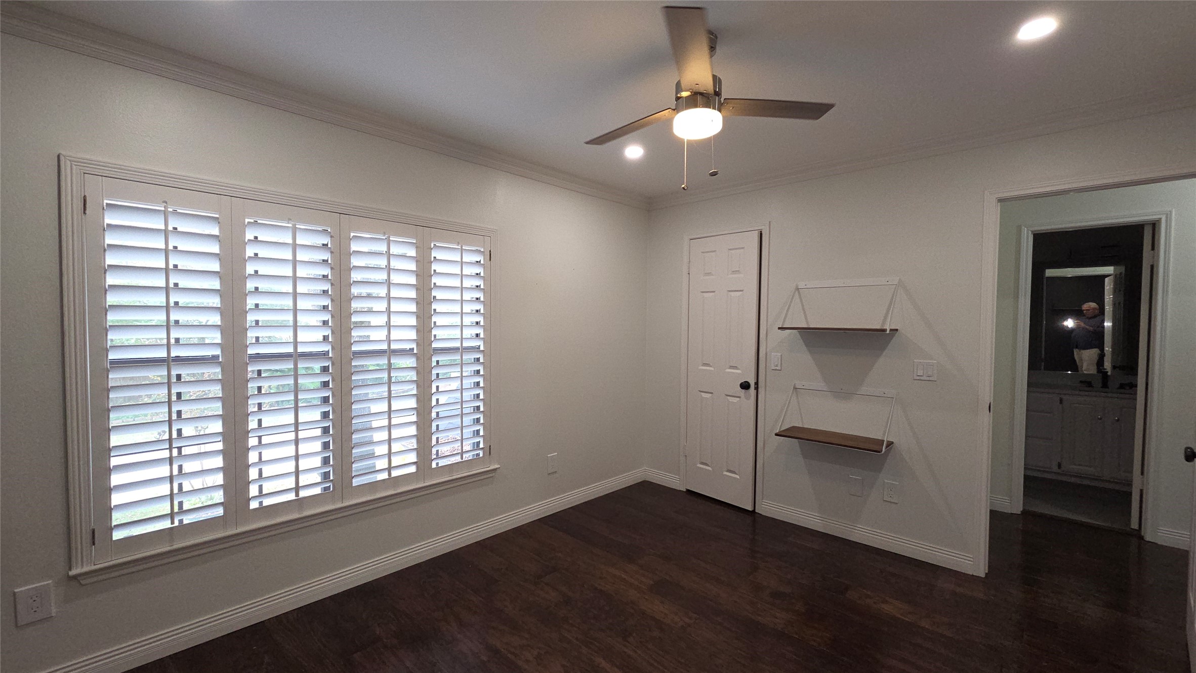 54 Thorn Berry Place Spring, TX 77381 - Photo 29 of 32 a view of an empty room with a window and wooden floor