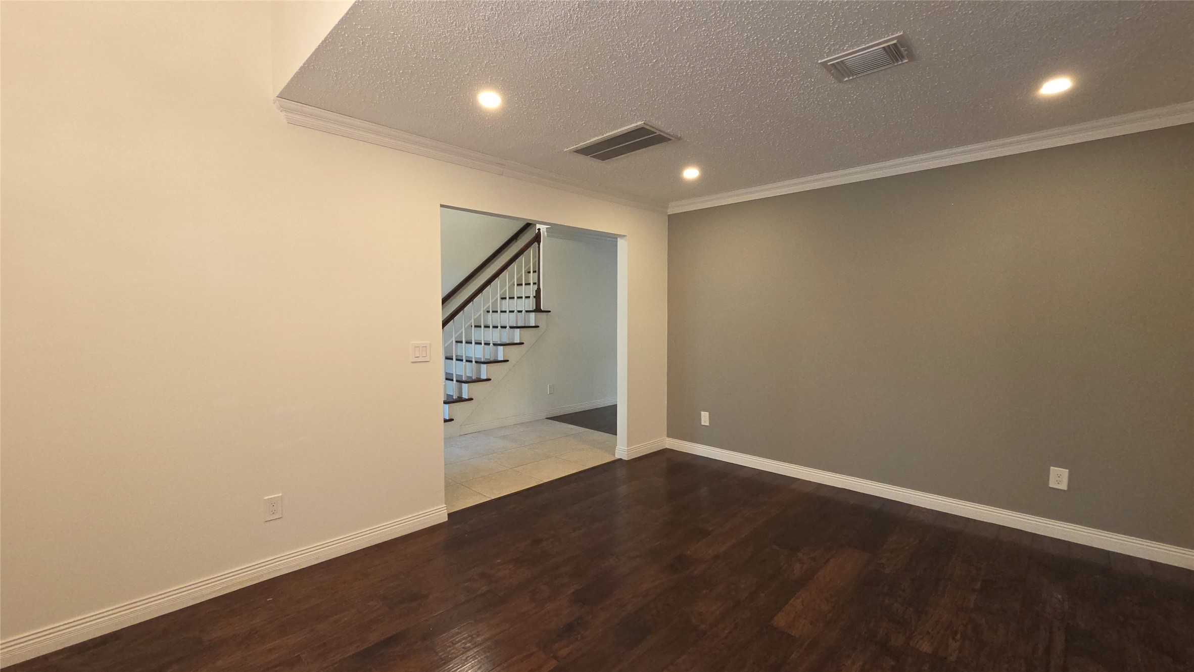 54 Thorn Berry Place Spring, TX 77381 - Photo 5 of 32 an empty room with wooden floor and windows