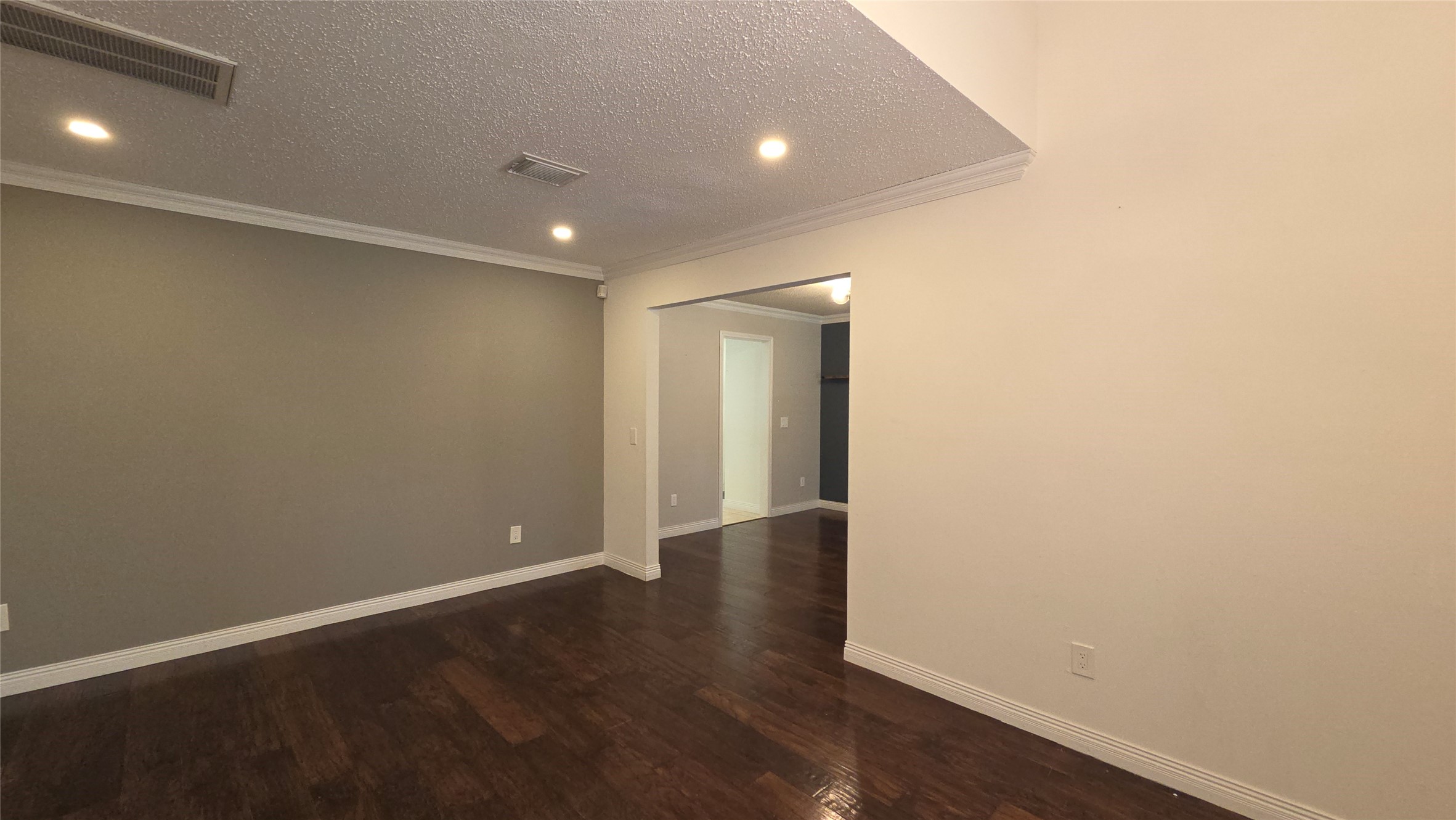 54 Thorn Berry Place Spring, TX 77381 - Photo 6 of 32 an empty room with wooden floor and windows