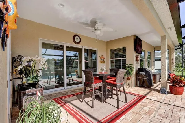 a work room with furniture and potted plants