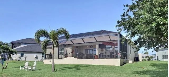 a view of a house with a yard