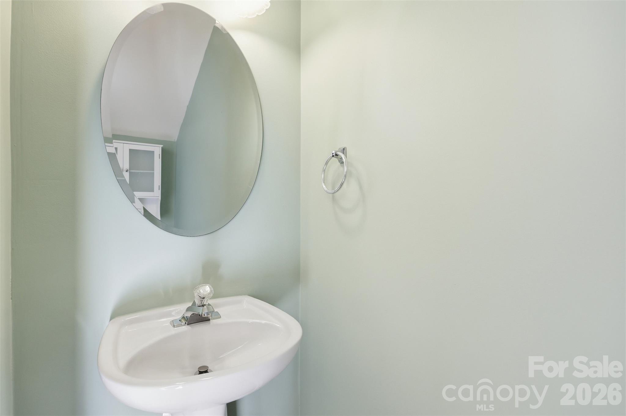 727 Shellstone Place Fort Mill, SC 29708 - Photo 12 of 31 a bathroom with a sink and a mirror