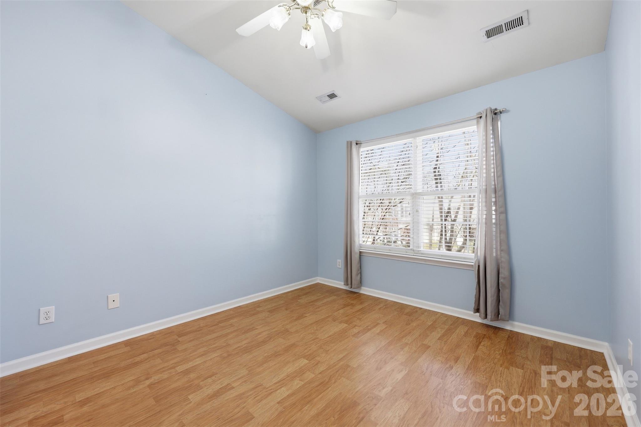 727 Shellstone Place Fort Mill, SC 29708 - Photo 13 of 31 a view of an empty room with a window