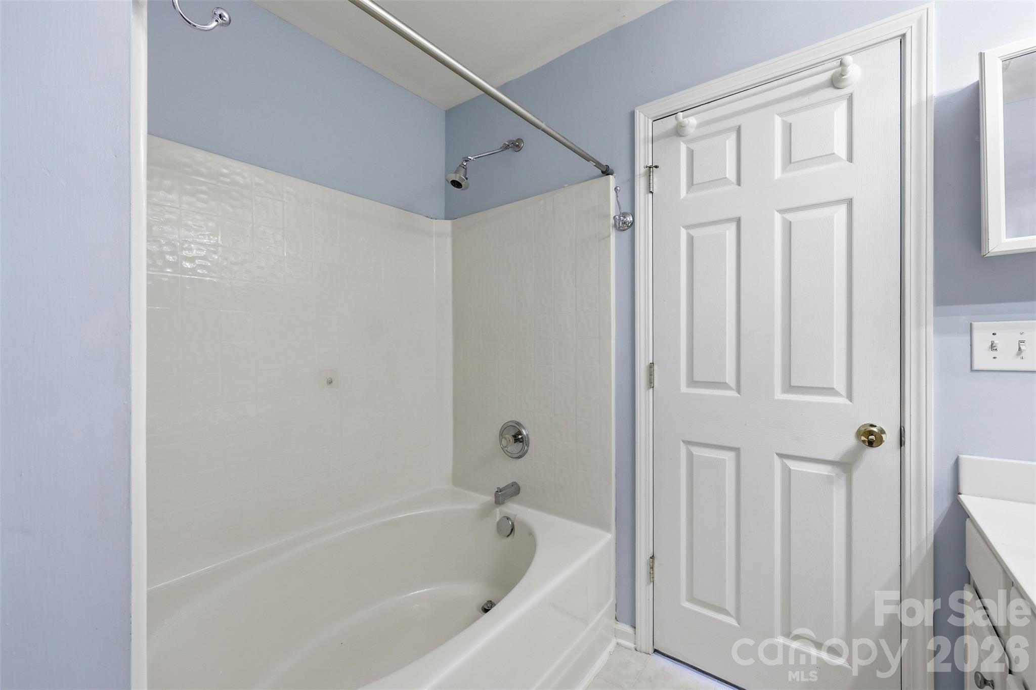 727 Shellstone Place Fort Mill, SC 29708 - Photo 18 of 31 a white bath tub sitting next to a shower
