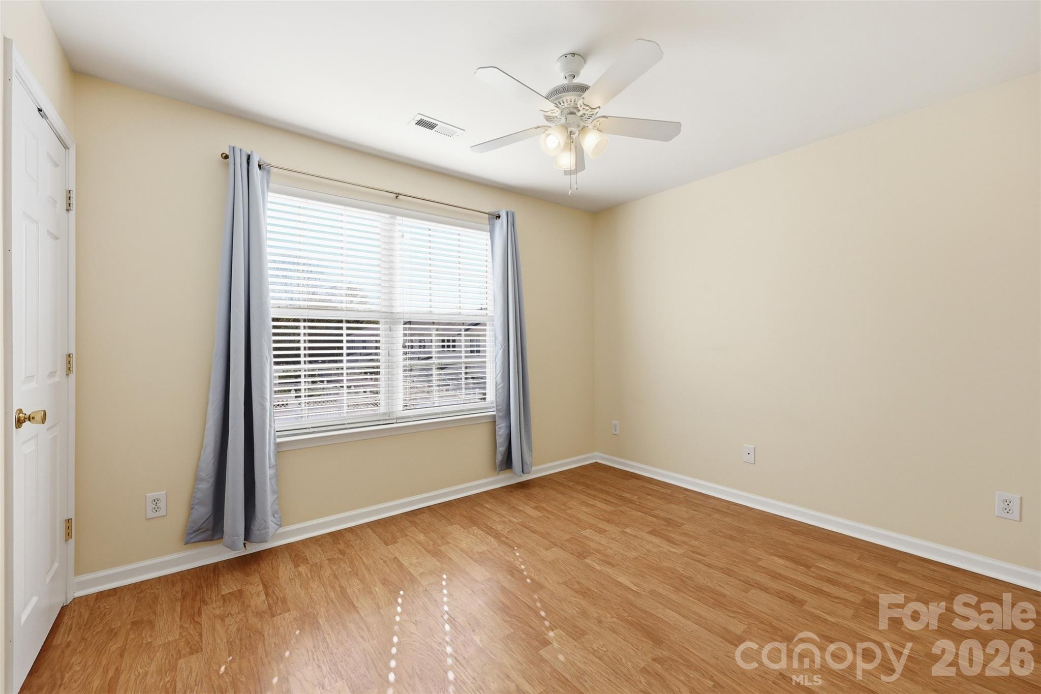 727 Shellstone Place Fort Mill, SC 29708 - Photo 19 of 31 a view of an empty room with a window