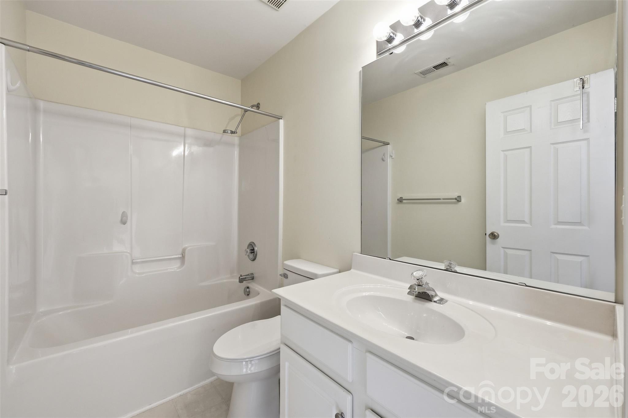 727 Shellstone Place Fort Mill, SC 29708 - Photo 20 of 31 a bathroom with a sink a toilet and shower