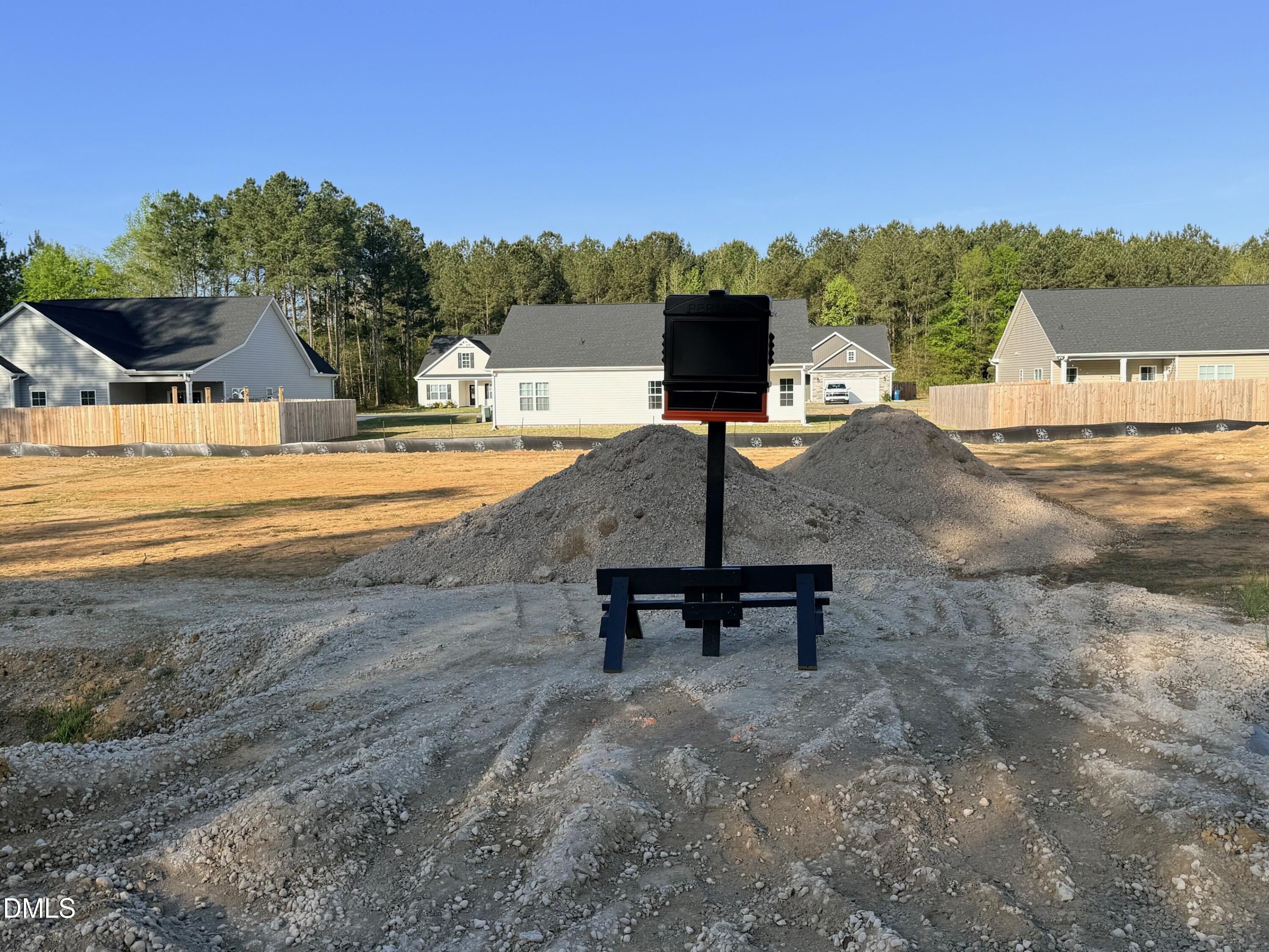 48 Loganberry Avenue Bunnlevel, NC 28323 - Photo 2 of 8 a view of a lake with outdoor space