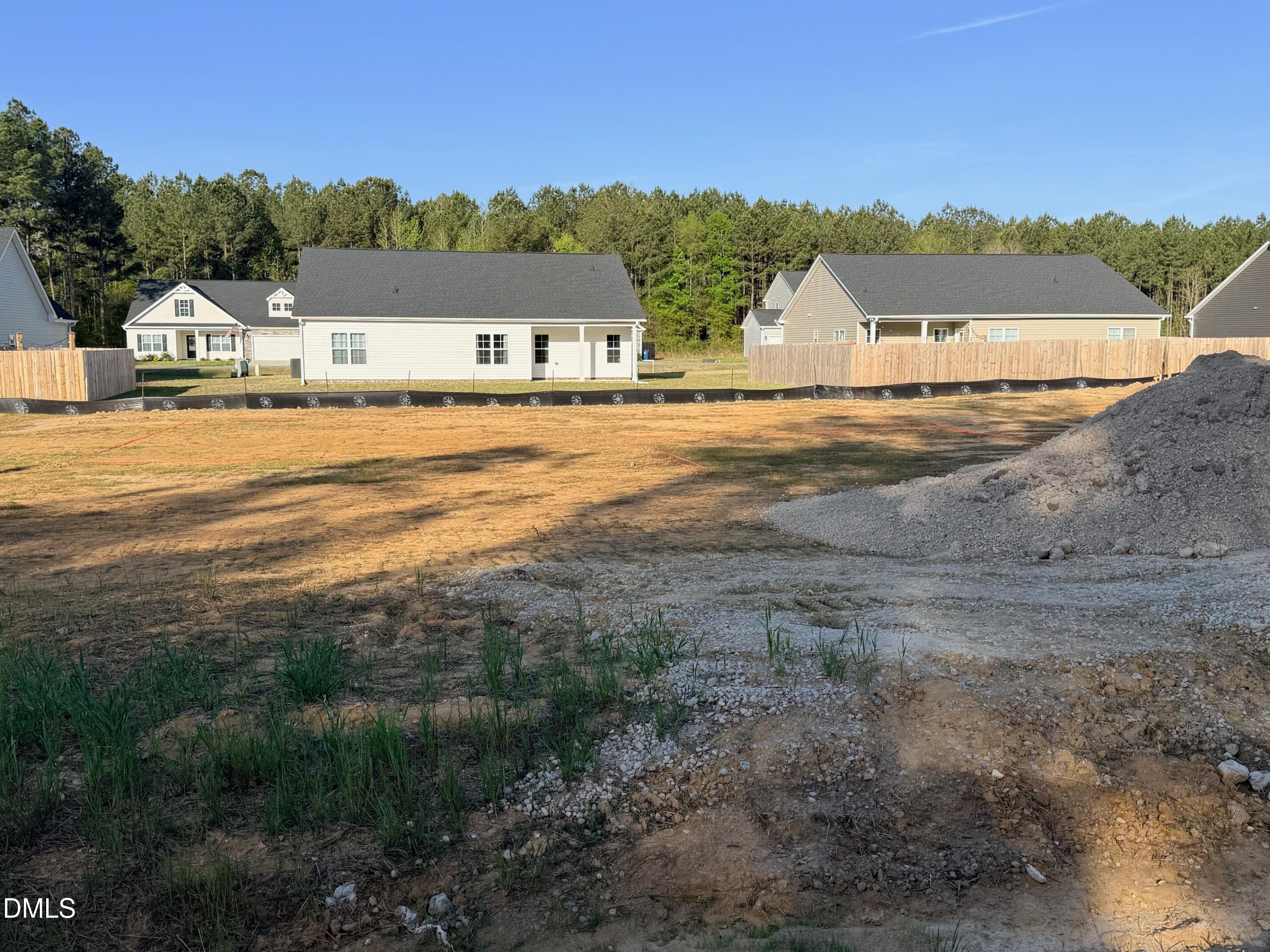48 Loganberry Avenue Bunnlevel, NC 28323 - Photo 4 of 8 a view of houses with outdoor space and river
