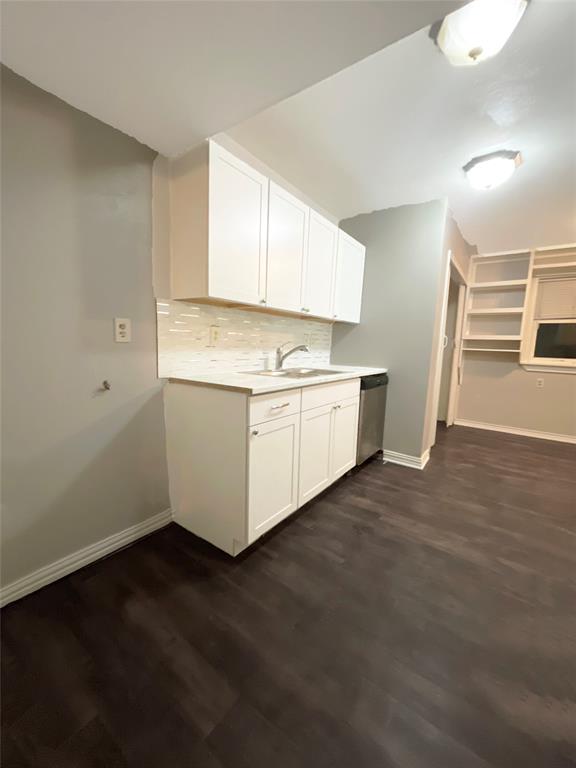 3924 Hunters Trail Mesquite, TX 75150 - Photo 12 of 23 a view of a kitchen with a sink and dishwasher