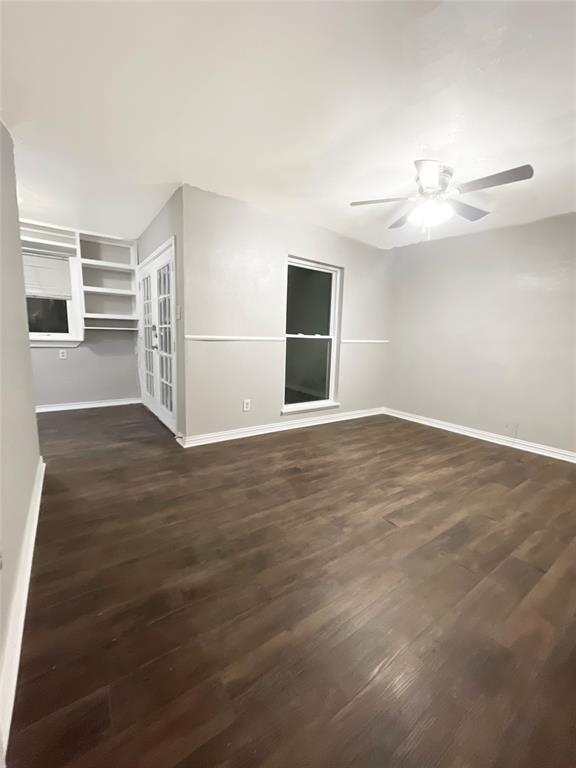3924 Hunters Trail Mesquite, TX 75150 - Photo 18 of 23 a view of empty room with wooden floor and fan