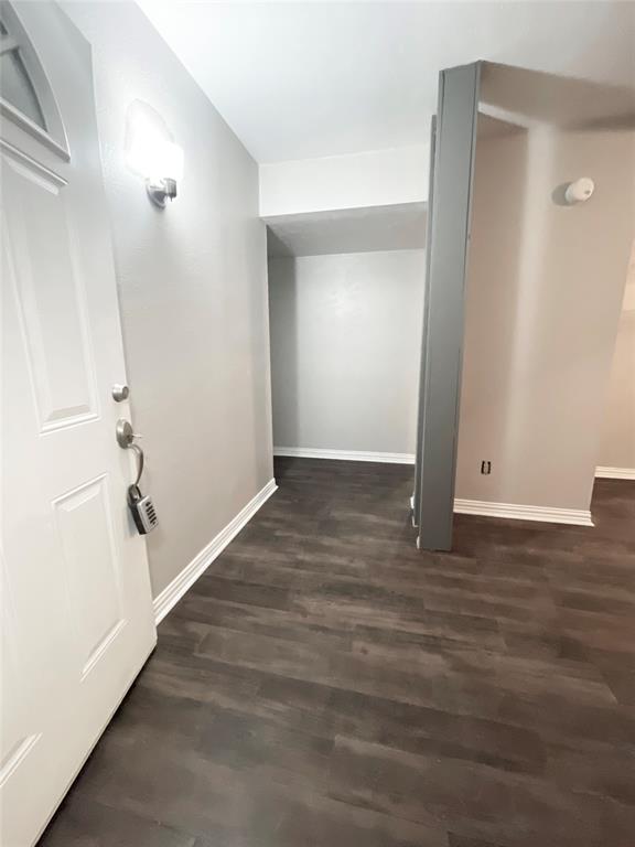 3924 Hunters Trail Mesquite, TX 75150 - Photo 2 of 23 a view of an empty room with wooden floor