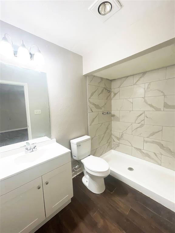 3924 Hunters Trail Mesquite, TX 75150 - Photo 23 of 23 a bathroom with a sink a toilet and shower