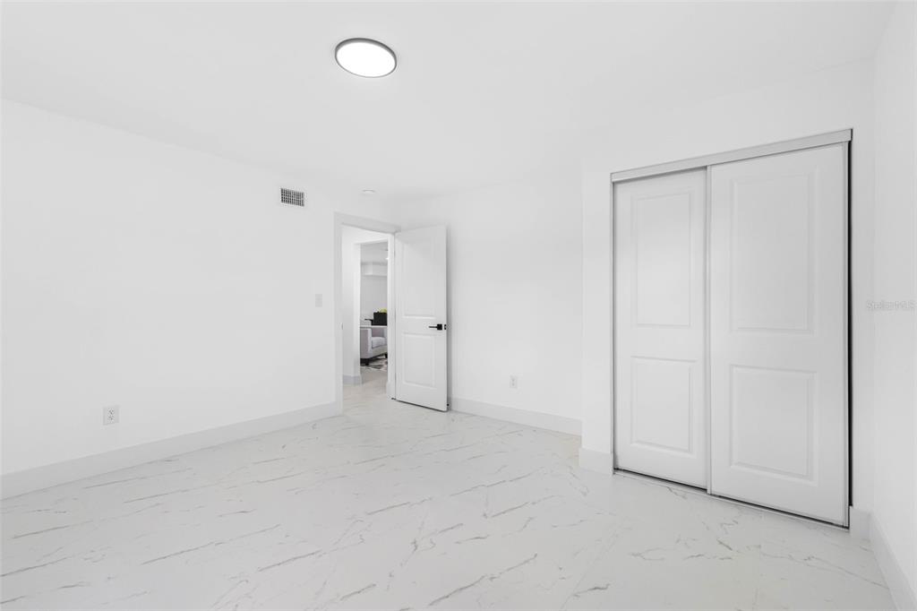 785 115th Avenue Treasure Island, FL 33706 - Photo 31 of 46 an empty room with closet area