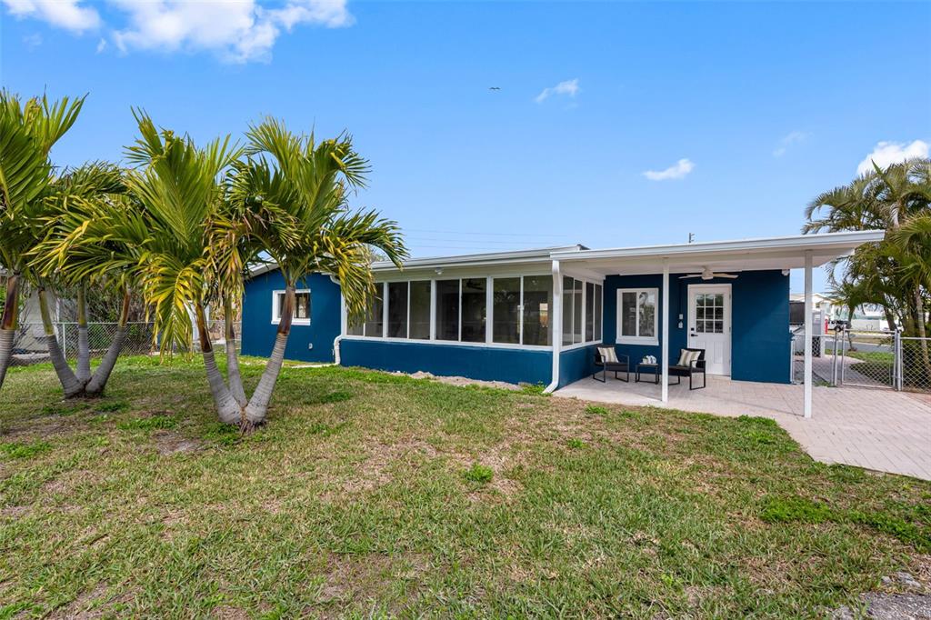 785 115th Avenue Treasure Island, FL 33706 - Photo 37 of 46 a house view with a garden space