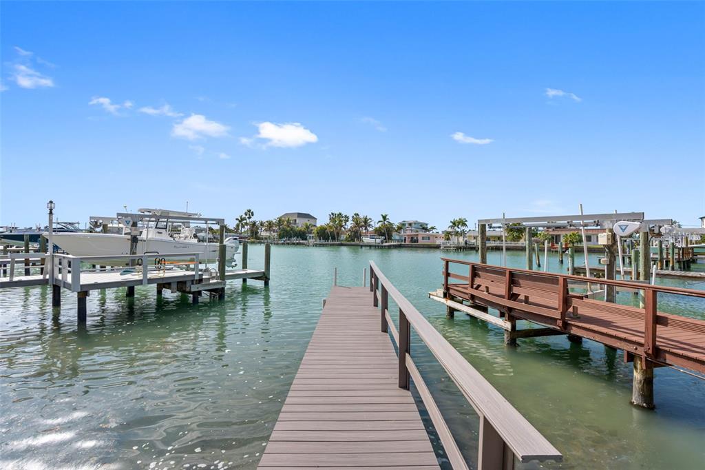 785 115th Avenue Treasure Island, FL 33706 - Photo 39 of 46 a view of a lake with outdoor seating