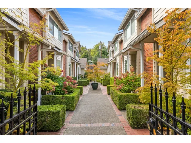 a view of a pathway both side of the building