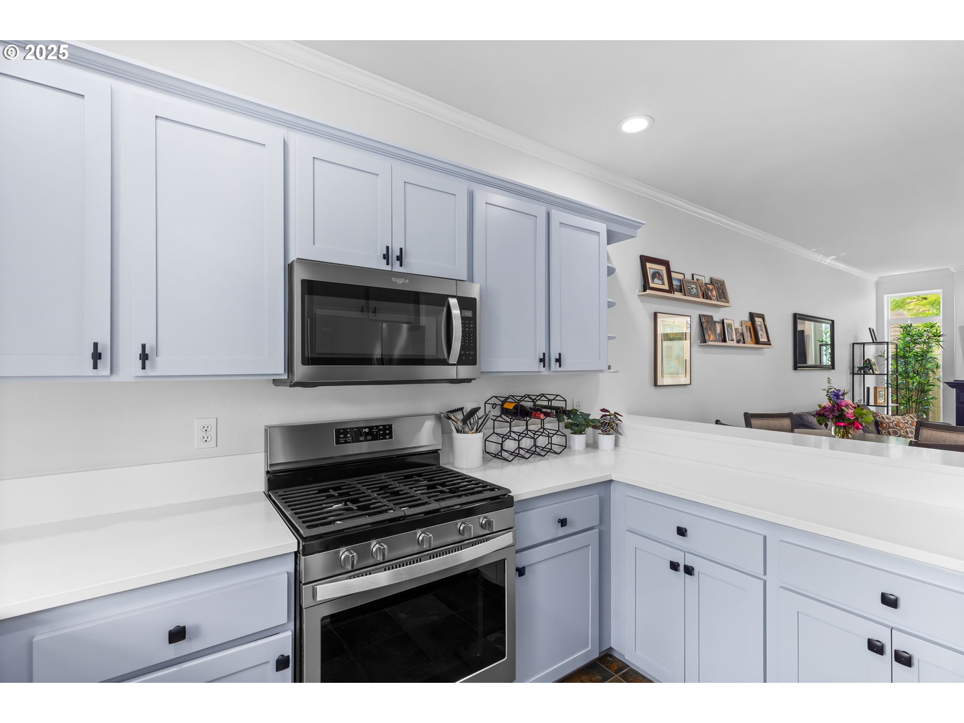436 5th Street Lake Oswego, OR 97034 - Photo 14 of 35 a kitchen with white cabinets and appliances
