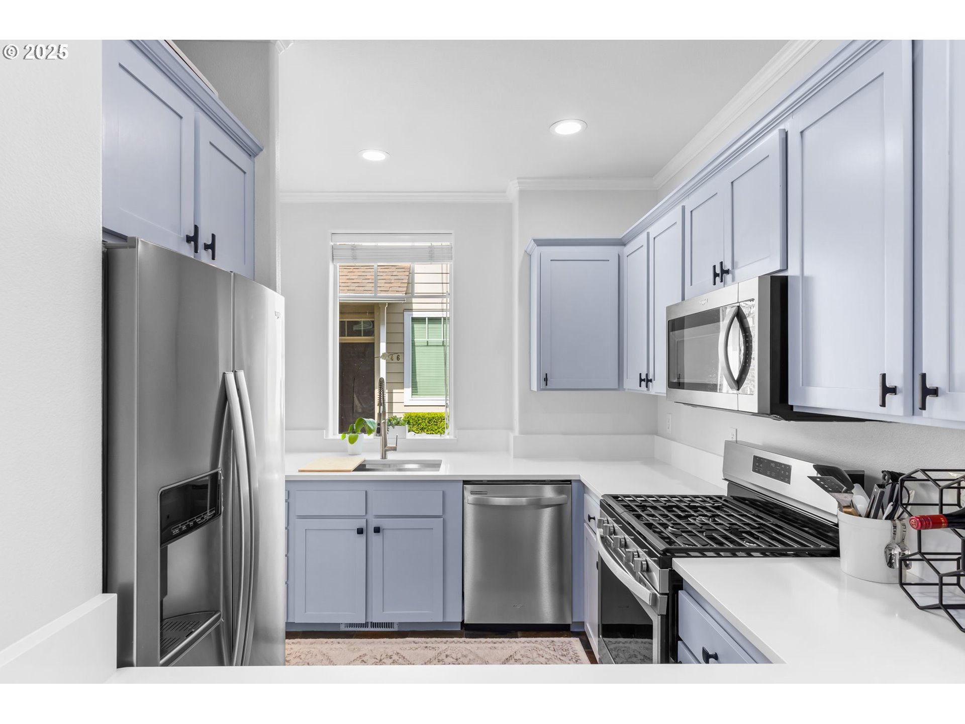 436 5th Street Lake Oswego, OR 97034 - Photo 9 of 35 a kitchen with stainless steel appliances granite countertop a refrigerator stove and sink